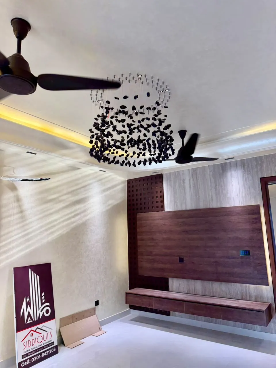 TV lounge with wooden media wall