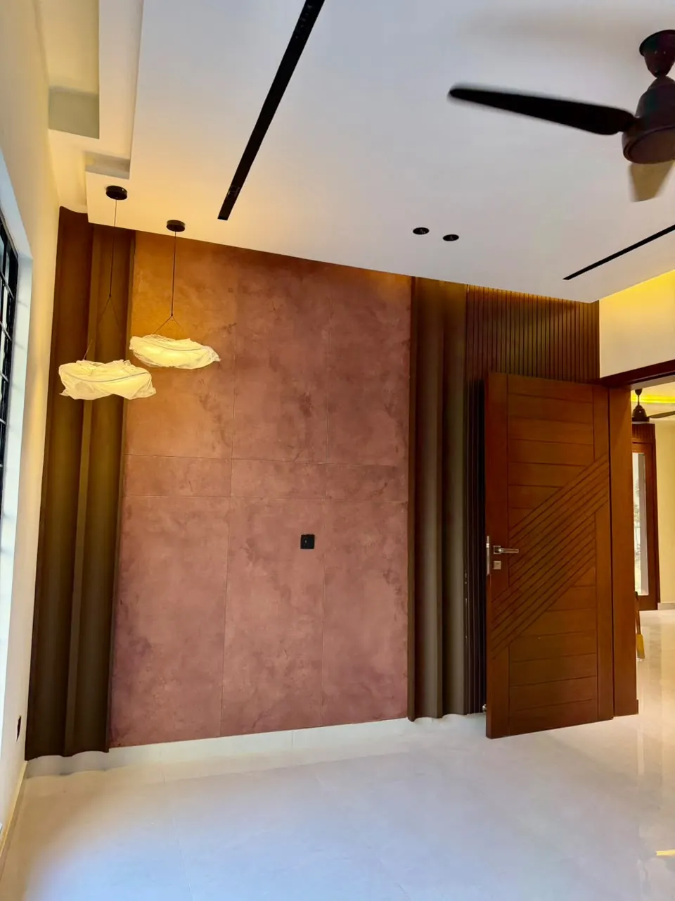 Bedroom with textured feature wall