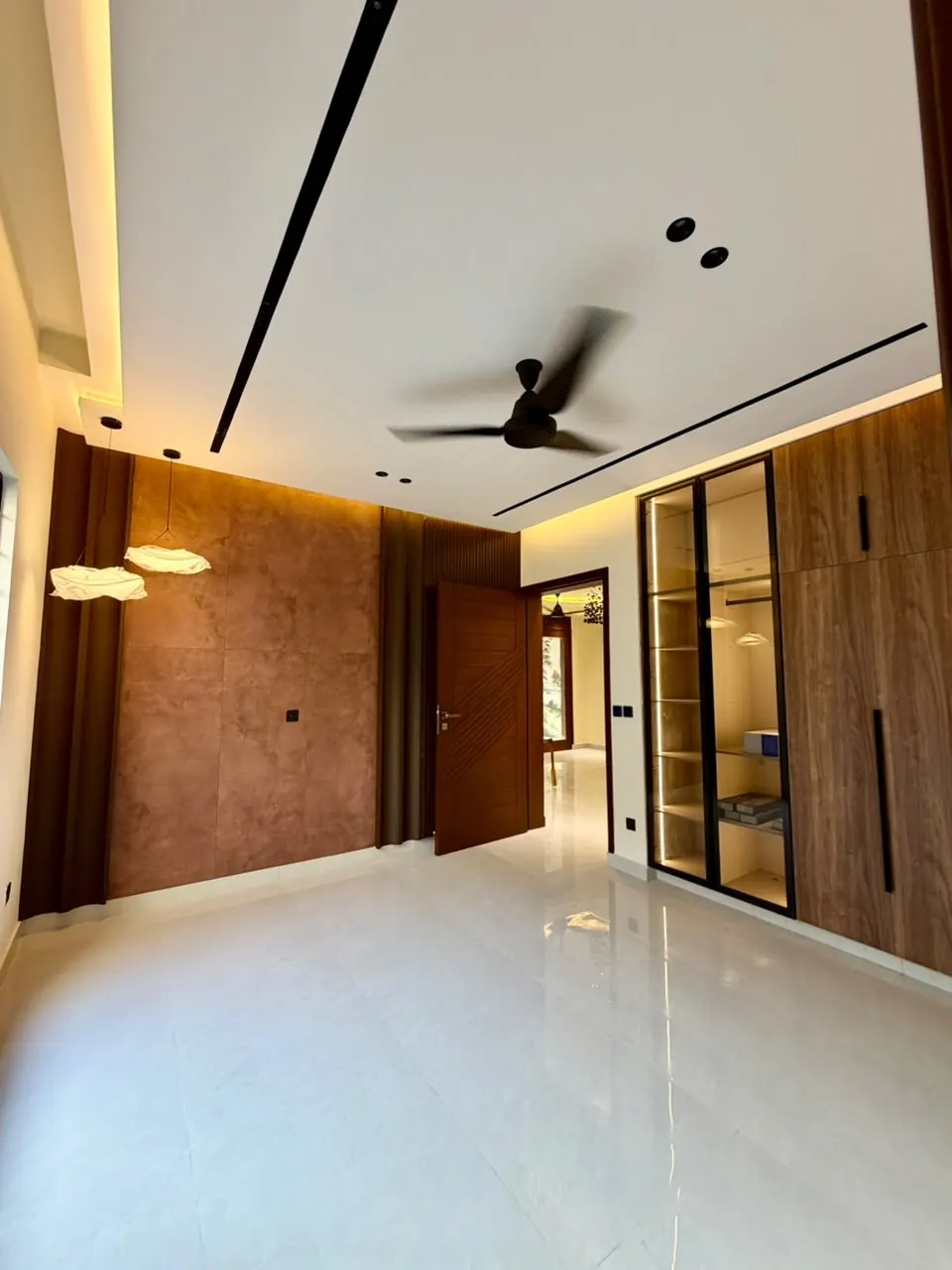 Bedroom with glass-front wardrobe