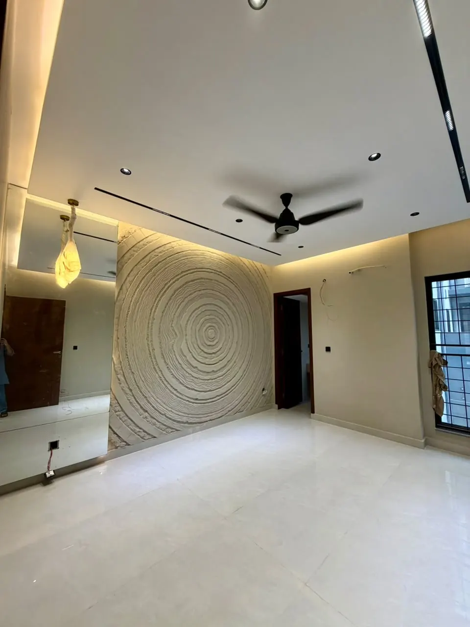 Bedroom with textured accent wall